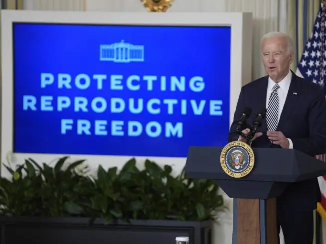 President Joe Biden speaks during a meeting with his reproductive rights task force to mark the 51st anniversary of the Roe v. Wade decision, in the State Dining Room of the White House, Monday, Jan. 22, 2024, in Washington.