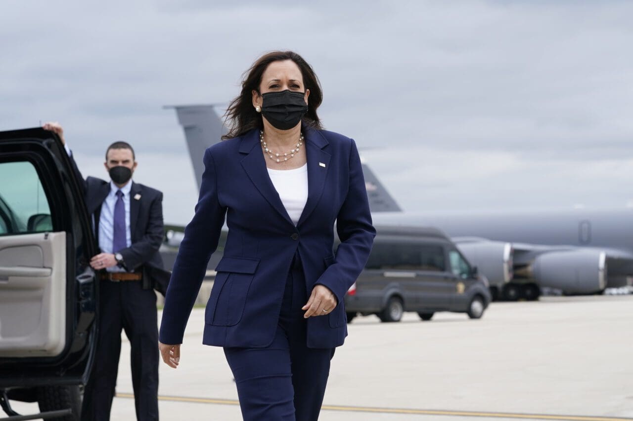 Vice President Kamala Harris walks to talk to reporters before boarding Air Force Two as she departs Milwaukee Mitchell International Airport in Milwaukee, Tuesday, May 4, 2021.