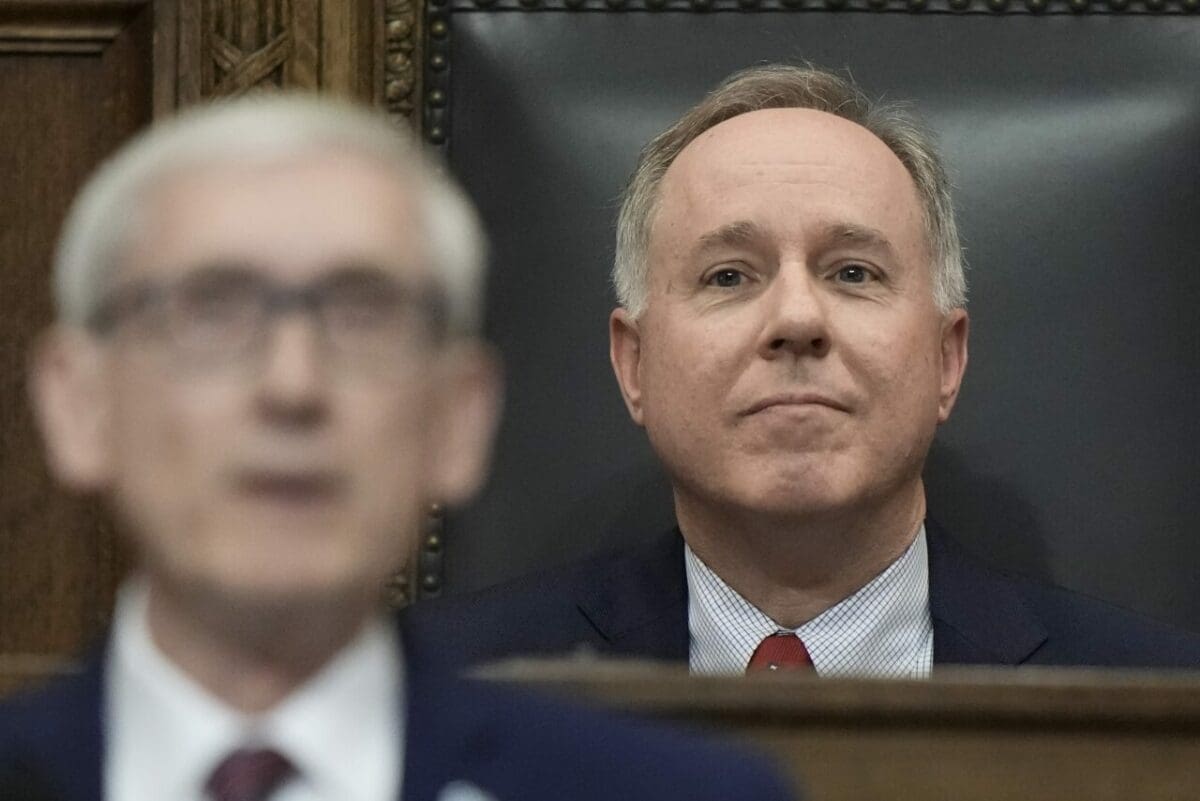 Speaker of the Assembly Robin Vos watches as Wisconsin Gov. Tony Evers speaks during the State of the State address, Jan. 24, 2023, in Madison, Wis.