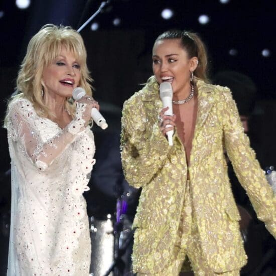 Dolly Parton, left, and Miley Cyrus perform "Jolene" at the 61st annual Grammy Awards in Los Angeles on Feb. 10, 2019.