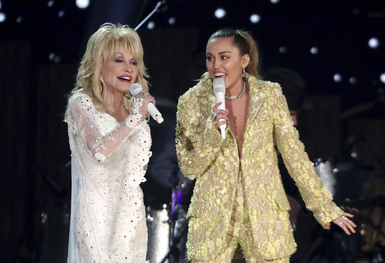 Dolly Parton, left, and Miley Cyrus perform "Jolene" at the 61st annual Grammy Awards in Los Angeles on Feb. 10, 2019.