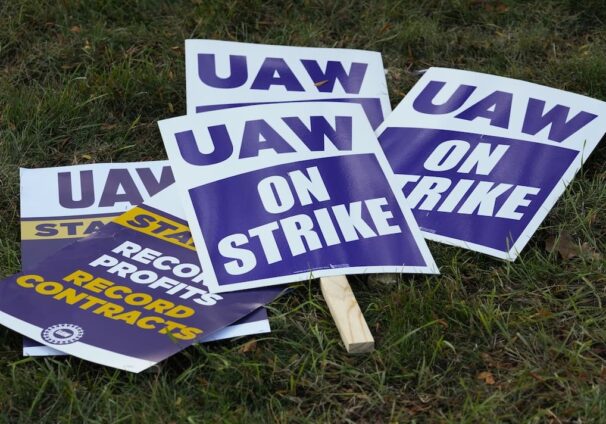 United Auto Workers signs for a strike are shown at the Stellantis Sterling Heights Assembly Plant, in Sterling Heights, Mich., Monday, Oct. 23, 2023. (AP Photo/Paul Sancya, File)
