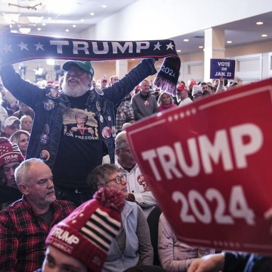 A supporter of Republican presidential candidate former President Donald Trump before he speaks during a campaign event in Atkinson, N.H., Tuesday, Jan. 16, 2024. (AP Photo/Matt Rourke)