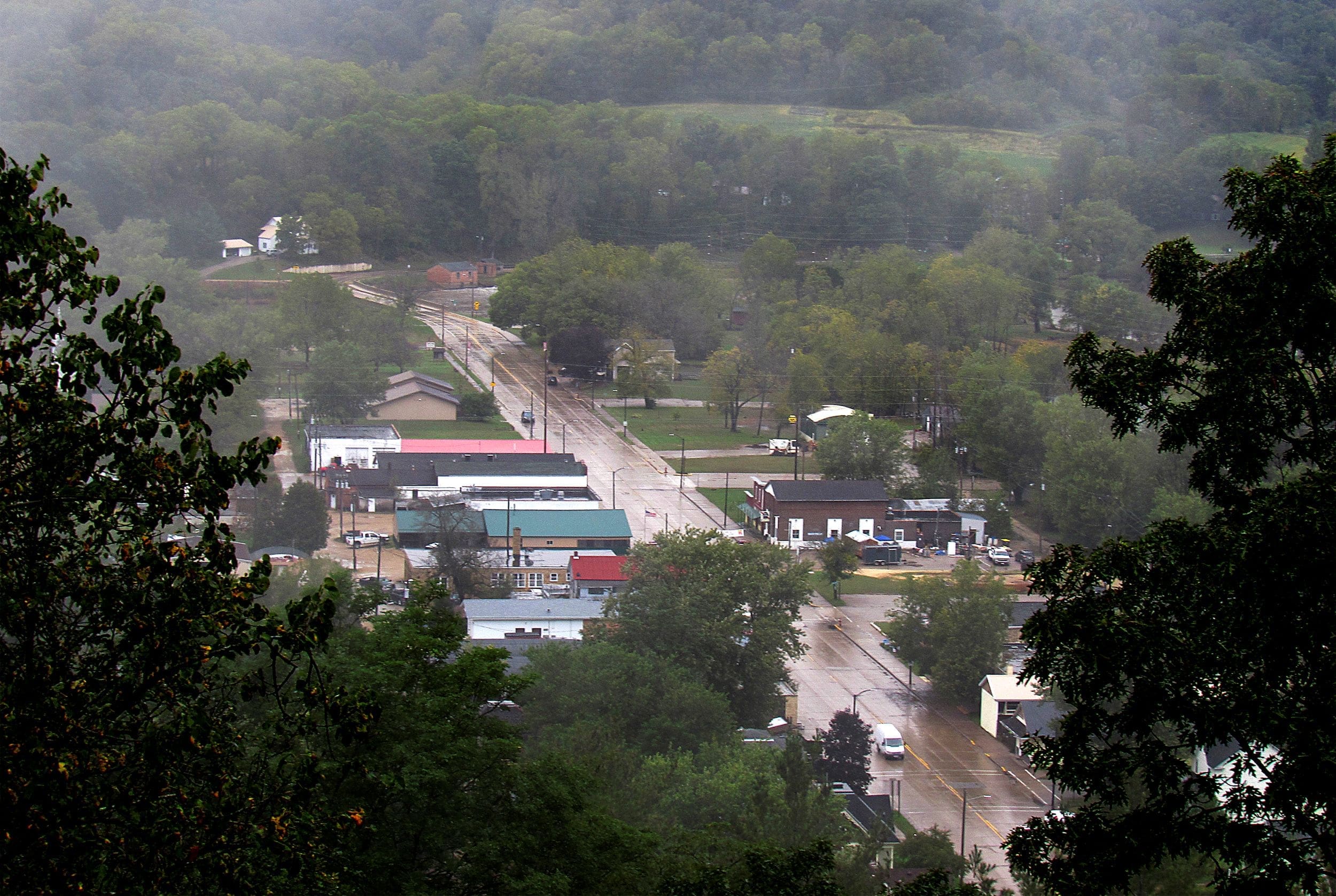In this Tuesday, Sept. 18, 2018 photo, a scenic overlook along Highway 171 provides a view of downtown Gays Mills, Wis., which has a long history of flooding from the Kickapoo River.